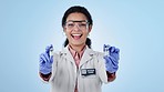 Face, woman and researcher with vaccine, decision and options on a blue studio background. Portrait, medical professional and scientist with vials, test tube and choice with healthcare and wellness