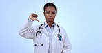 Thumbs down, review and face of doctor or woman isolated on studio background and rejection, fail or news, Bad, feedback and portrait of healthcare nurse gesture disapproval or disappointment