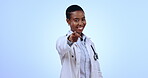 Invitation, doctor and black woman pointing to come here in studio isolated on a blue studio background mockup space. Portrait, smile and medical worker invite, call or welcome to hospital for health