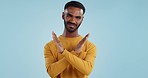 Shaking head, no and face of a man with stop, rejection and disappointment on a studio background. Sad, angry and portrait of a person with a gesture for a protest, disapproval or refusal with mockup