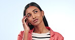 Confused, woman and thinking of question for solution or ideas on blue background in studio with doubt. Girl, planning or university student brainstorming creative decision, choice or problem solving