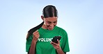 Happy woman, phone and volunteer with fist pump for winning or good news against a studio background. Excited female person smile in celebration with mobile smartphone for achievement, bonus or sale