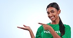 Happy woman, volunteer and palm pointing to mockup in advertising or marketing against a studio background. Portrait of female person smile and showing notification for donation, list or information