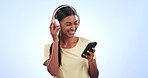 Happy woman, headphones and phone dancing to music, podcast or songs against a studio background. Female person smile listening with mobile smartphone for audio streaming, sound track or playlist