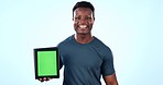 Tablet mockup, green screen and black man with advertising for gym, fitness app and point at ads on blue background. Tracking marker, promo and marketing with personal trainer and join us in studio