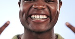 Closeup, gesture and a black man with dental health pride, teeth results and on a studio background. Happy, face portrait and an African person showing progress of mouth with braces or veneers