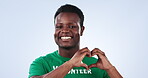 Volunteer, happy black man and studio heart sign for charity kindness, eco pollution support or community service care. Love emoji icon, climate change help and NGO model portrait on blue background