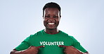 Volunteer shirt, happy black man and ok sign for studio feedback, pollution support or nonprofit society. Okay emoji icon, charity foundation recruitment or activist pride portrait on blue background