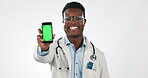 Doctor, phone green screen and happy black man with website logo, hospital contact info or medical studio brand. Cellphone, mockup space and portrait surgeon show healthcare news on blue background