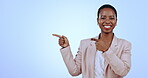 Business black woman, portrait and pointing to blue background space for consulting offer, deal and yes opportunity. Happy, face or consultant with studio sales mockup, choice and marketing promotion