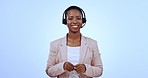 Call center, talking and black woman in studio for help, customer support or online consulting. Telemarketing, blue background and portrait of happy person for crm business, service and communication