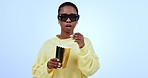 Face, 3d glasses and black woman with popcorn, film and entertainment on a blue studio background. Portrait, African person and model with cinema snack, television and eyewear with streaming movie