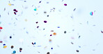 Party, winning and confetti on a studio background for celebration, creativity or a birthday. Empty, color and decoration on a backdrop for festive aesthetic, artistic or for success or jackpot