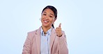 Thumbs up, woman face and hand pointing at you in studio with thank you for small business support on blue background. Portrait, emoji or Asian entrepreneur with finger sign for choice, offer or vote