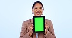 Green screen, tablet and business Asian woman in studio for website, internet and social media. Corporate, advertising and portrait of person on digital tech with mockup space on blue background