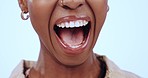 Excited, black woman and mouth from surprise yell, win and announcement in studio. Wow, scream and happy smile of African female person with achievement, promotion and good news with blue background