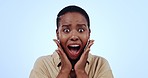 Excited, black woman and winner face from surprise and announcement in a studio. Wow, yelling and happy smile of a African female person with achievement, promotion and good news with blue background
