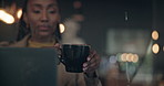 Black woman, coffee shop and laptop for online work and freelance for job, remote and internet. Drinking, tea and enjoying in morning, gloomy and relaxed for career, hot beverage and hybrid working