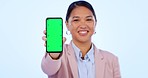 Green screen, phone and business woman in studio for website, internet and social media. Corporate worker, advertising and portrait of happy person on smartphone with mockup space on blue background