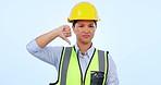 Thumbs down, engineering and construction woman in studio for negative review, bad news and no sign. Architecture, emoji and portrait of person with hand gesture for inspection on blue background