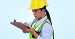 Woman, engineer and checklist to write in studio, maintenance and inspection in safety gear . Asian person, construction worker and architect in industry, plan and document for architecture in mockup