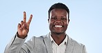 Business, portrait and black man with peace sign, support and opportunity on blue studio background. Face, African person and employee with hand gesture, review and choice with promotion and decision