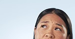 Thinking, woman and confused eyes in studio for problem solving, brainstorming ideas and mockup of questions on blue background. Closeup face of asian model planning choice of decision, memory or why