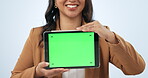 Green screen, hands or tablet in studio by online shopping or sale on website for advertising space. Closeup, smile or happy woman showing mockup option, news or technology offer on white background