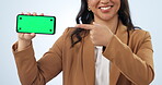 Happy, woman and pointing to phone, green screen or mockup with mobile app, website or social media. Hand, gesture or person show cellphone, marketing or online offer or communication of announcement