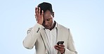 Stress, phone and black man in studio networking on social media, mobile app or the internet. Frustrated, technology and young African male person scroll on cellphone with mistake by white background