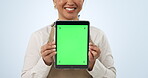 Happy woman, hands and tablet green screen in advertising, marketing or cafe against a studio background. Closeup of female person or small business waitress showing technology app, display or mockup