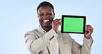 Happy black man, tablet and green screen for advertising or marketing against a studio background. Portrait of African businessman showing technology display, app or tracking markers on mockup space