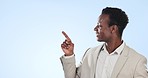 Happy black man, pointing and options in advertising or marketing in studio against a blue background. Portrait of African businessman smile and showing steps, list or information on mockup space