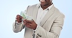 Businessman, hands and counting money in finance, profit or investment against a studio background. Closeup of business person with cash, dollar bills or paper notes in financial freedom or salary