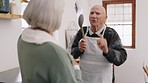 Kitchen, singing and senior couple dance together with cooking utensils for lunch, supper and dinner. Marriage, retirement and happy man and woman at home for meal prep for bonding, fun and playful