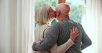 Window, kiss or old couple hug with love, support or care in marriage, retirement or morning. Peace, romantic mature man or senior woman bonding together on holiday vacation break to relax at home