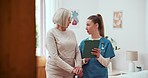 Senior woman, nurse or tablet for rehabilitation trust, healthcare or wellness results. Elderly patient, walking stick or talking medical caregiver on technology in home support, consulting or help