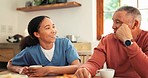 Caregiver, senior man and coffee with breakfast conversation, advice and happy for listening in nursing home. Nurse, elderly patient and relax with smile, drink or tea cup for talking in retirement