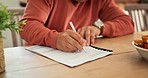 Senior man, hands and writing on documents, form or application for retirement, life insurance or finance. Closeup of mature male person filling in paperwork, signature or legal agreement at home