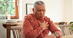 Heart attack, stress and senior man in his home coughing, problem or breathing, risk or emergency. Chest pain, hand and elderly male person with anxiety, asthma or heartburn, fear or panic in a house