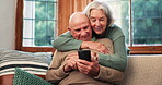 Senior couple, hug and relax on sofa with phone, app or streaming a video on social media with internet. Reading, cellphone and happy old people in retirement with love or scroll news in living room