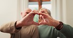 Heart, hands and senior couple with love, care and support of trust, gratitude and icon at home. Closeup of man, woman and emoji of peace, hope and loyalty of kindness, respect and sign in retirement