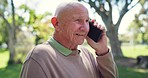 Phone call, happy and senior man in park for contact, funny conversation and chat outdoor. Retirement, communication and laughing while talking on smartphone for joke, discussion and mobile in garden