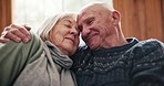 Face, love and senior couple hug in a living room with support, care and trust in their home together. Security, care and old people embrace in a house bonding, relax and enjoy retirement together