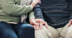 Senior, couple and holding hands for empathy, support and care on sofa in living room for retirement. Elderly, man and woman with sympathy, compassion and love for relationship or commitment on couch