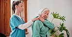 Physiotherapist, nurse and senior woman with shoulder pain, consultation and healthcare with rehabilitation. Mature person, patient or elderly lady with injury, accident or conversation with wellness