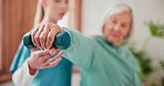 Consultation, nurse or senior woman with dumbbell, stretching or healthcare with rehabilitation. Mature person, patient or elderly lady with caregiver, professional or physiotherapist with wellness