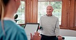 Physiotherapy, old man and tablet with dumbbells, exercise and workout app for progress in nursing home. Senior person, nurse woman and analysis for muscle, rehabilitation or exercise in retirement