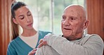Physiotherapist, senior man and help for shoulder, pain or consultation for healthcare in nursing home. Elderly person, nurse and talking for muscle injury, rehabilitation or recovery in retirement