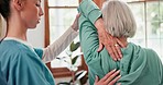 Healthcare, nurse and senior woman with exercise, stretching and recovery with rehabilitation. Mature person, patient and elderly lady with healing, physical therapist and conversation with wellness